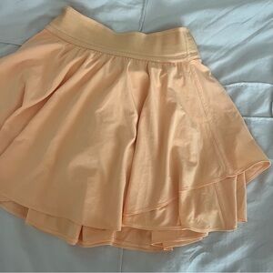 Lululemon orange high rise tennis skirt size 2